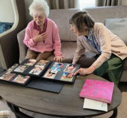 Avocet House reminisce over scrapbook
