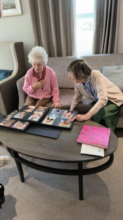 Avocet House reminisce over scrapbook